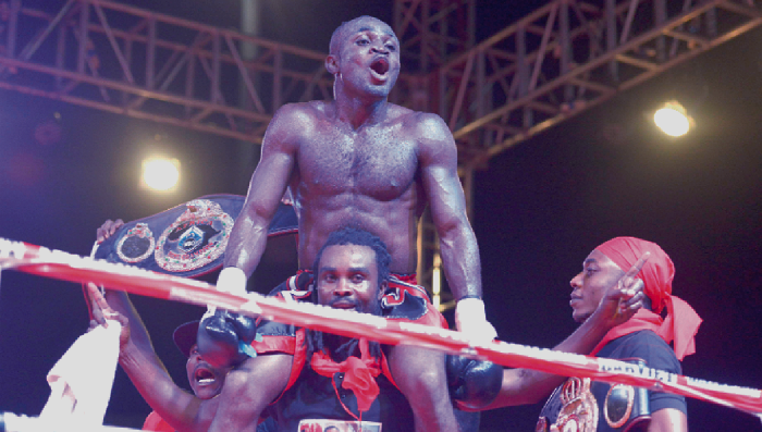 “Gameboy” being carried shoulder high after his feat